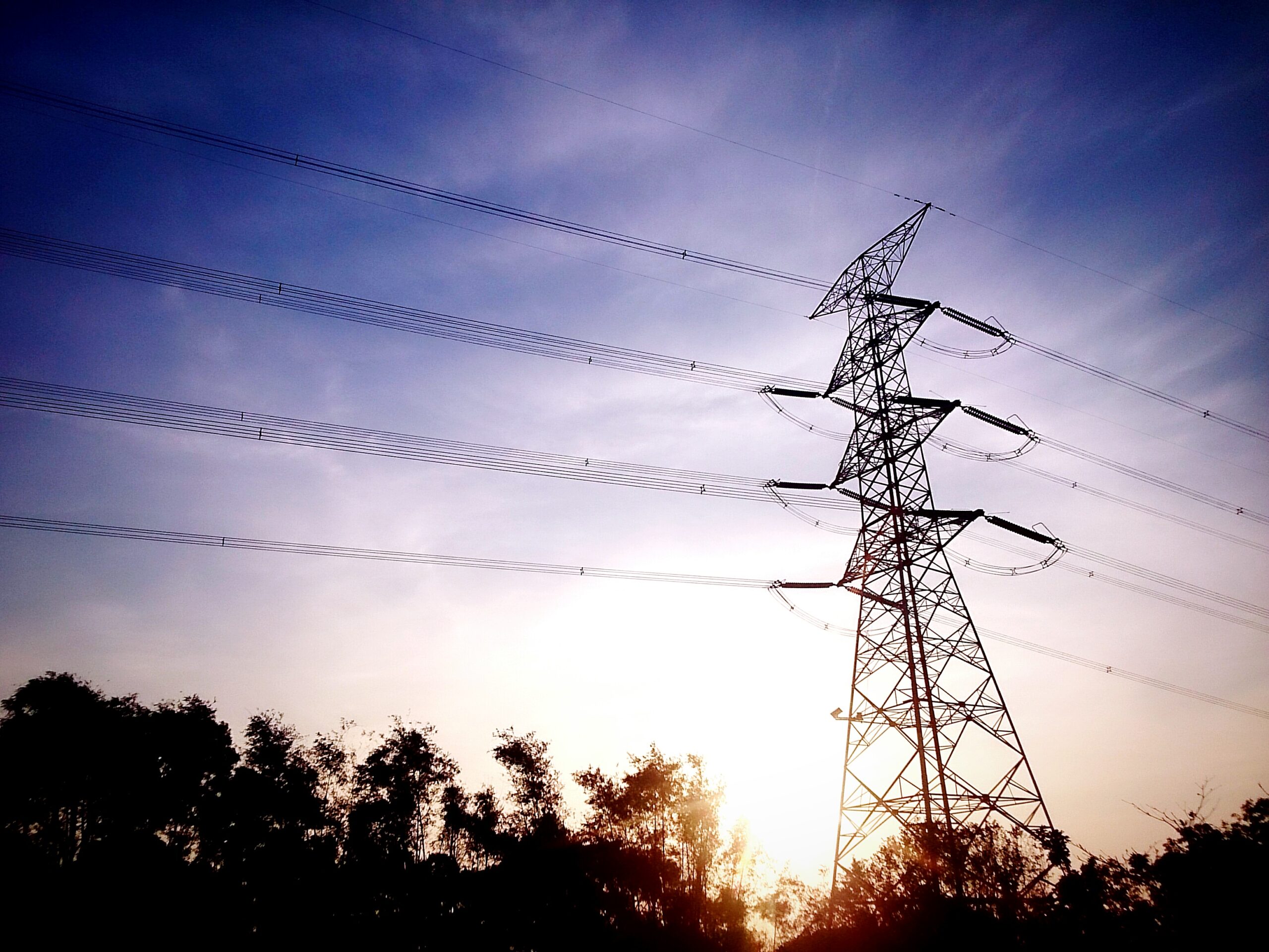 low-angle-view-electricity-pylon